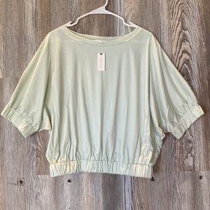 Anthropology mint green top with elastic waste, M